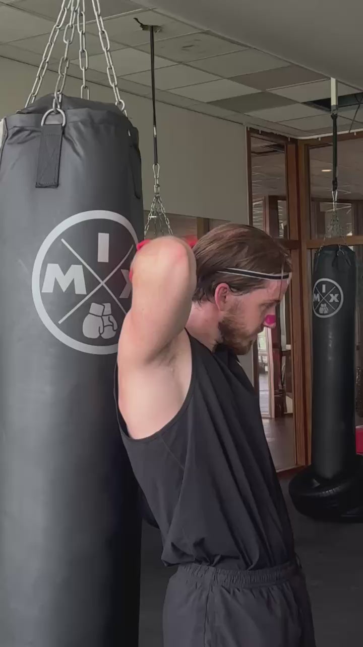 Pink nasal strip and kickboxing